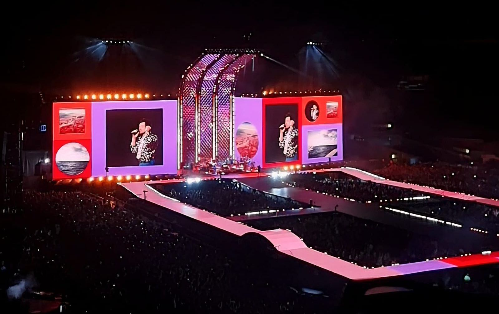 Harry Styles canta ‘Magalenha’ em português com leque LGBT no Morumbi
